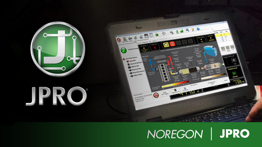 Technician using JPRO software for vehicle diagnostics